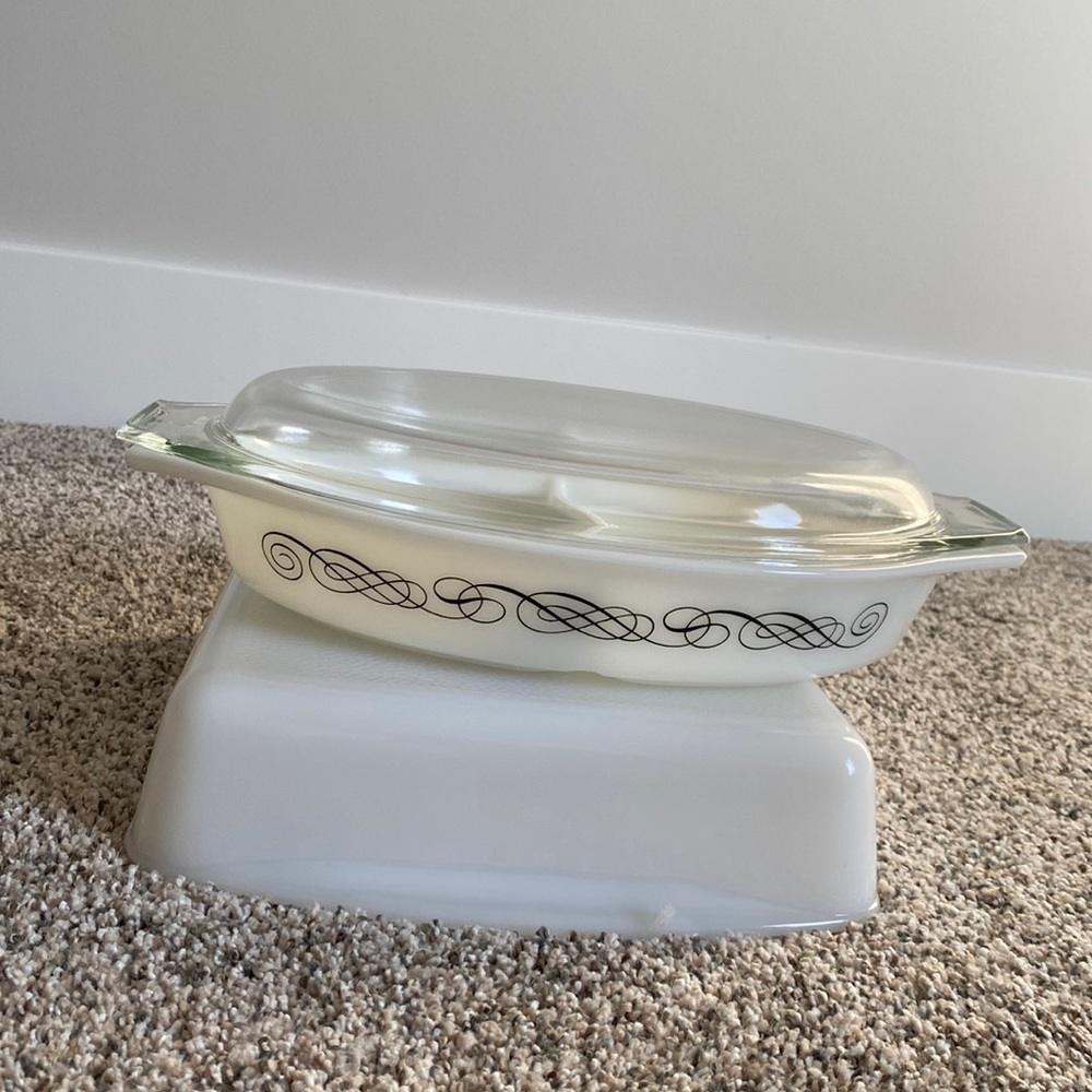 RARE FIND
Price: $54.00
Pyrex Black Scroll Promotional Divided Casserole Dish